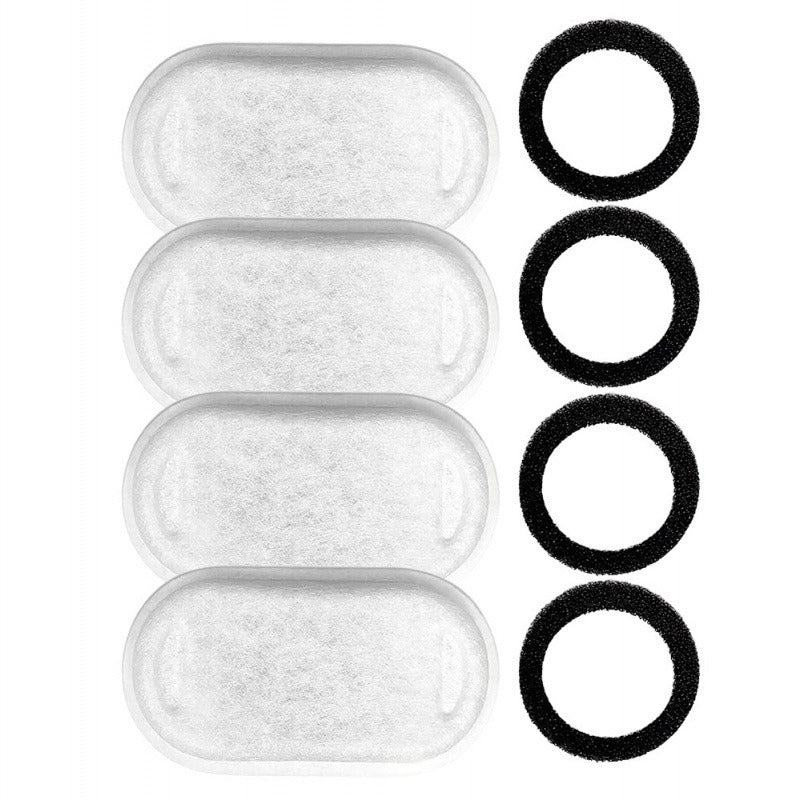 4 activated carbon filter pads and 4 foam pre-filter rings laid flat